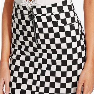 Shein size medium black and white checked mini skirt.  Super mod and retro.